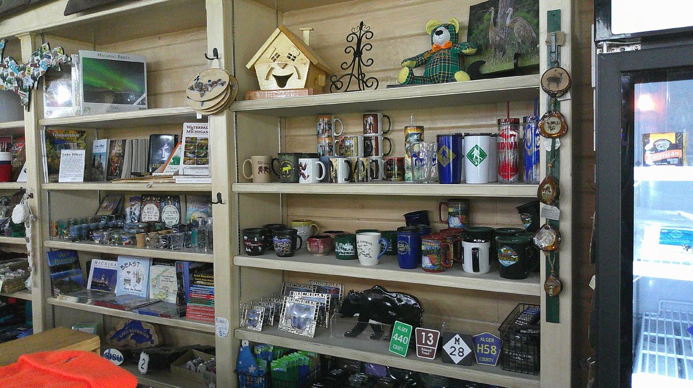 UP souvenirs, mugs, and local books