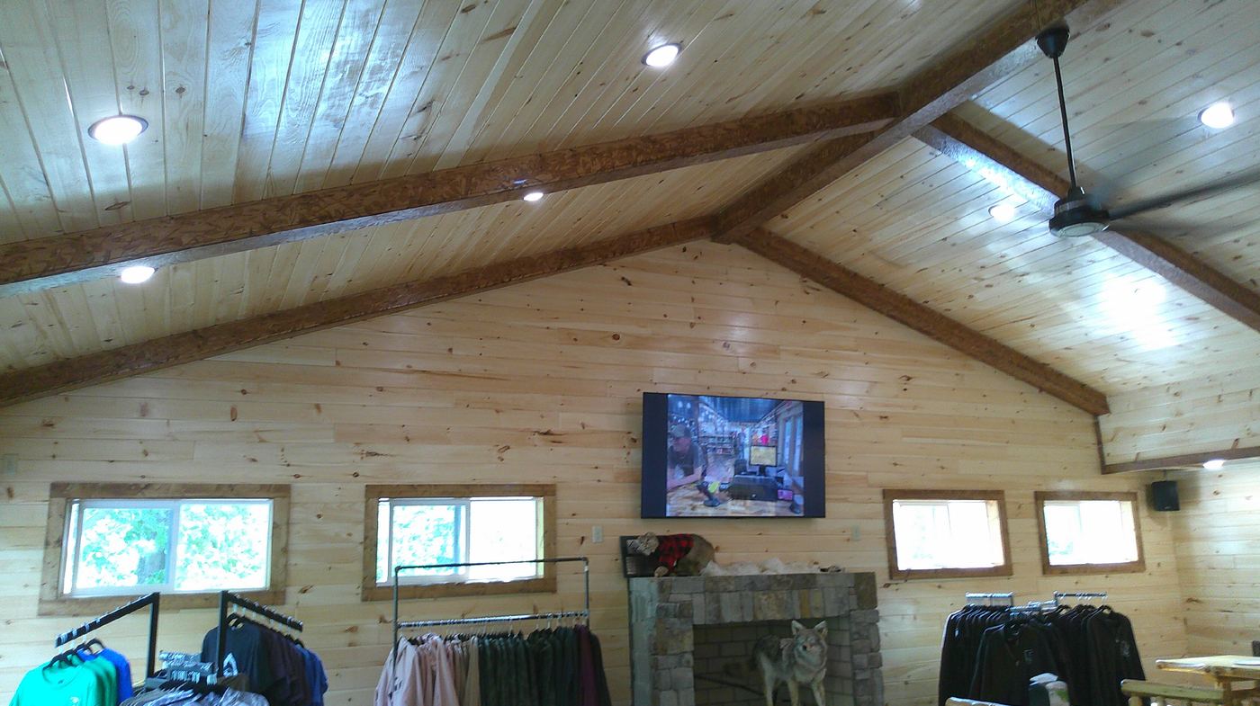 Cathedral pine ceiling with exposed beams