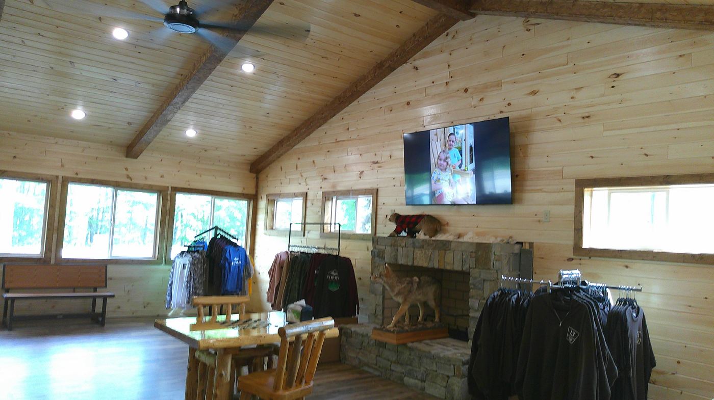 Full store interior with fireplace and clothing