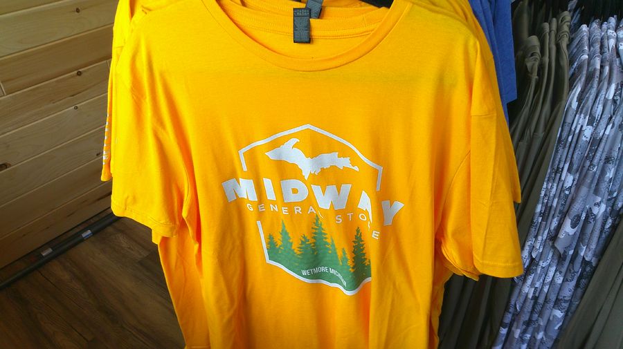 Midway General Store yellow tee with UP silhouette and pine trees — Wetmore Michigan