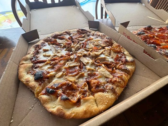 Fresh hand-tossed pizza from Midway General Store