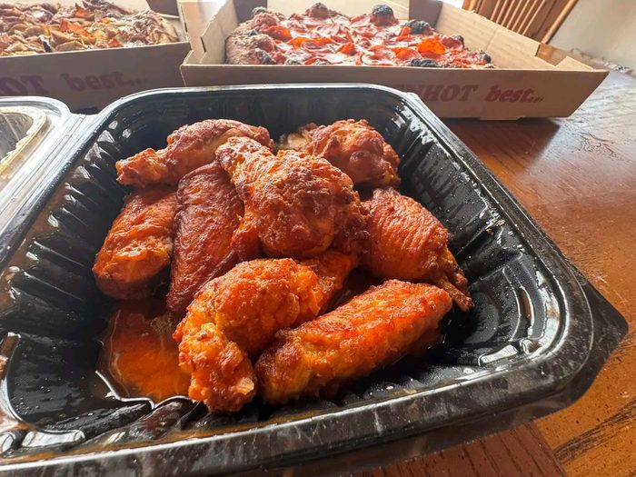 Bone-in chicken wings tossed in buffalo sauce